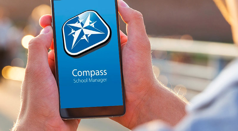 Photo of parent using the Compass Parent Portal app