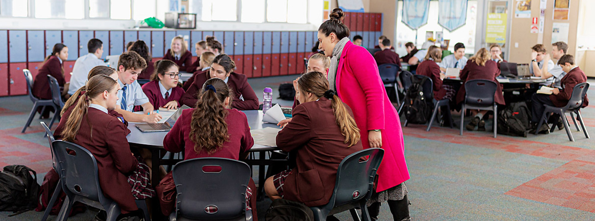 Dedicated teacher with class at Bede Polding Catholic College South Windsor