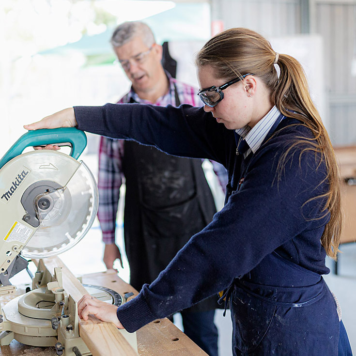 Dedicated TAS teacher with student at Bede Polding Catholic College South Windsor