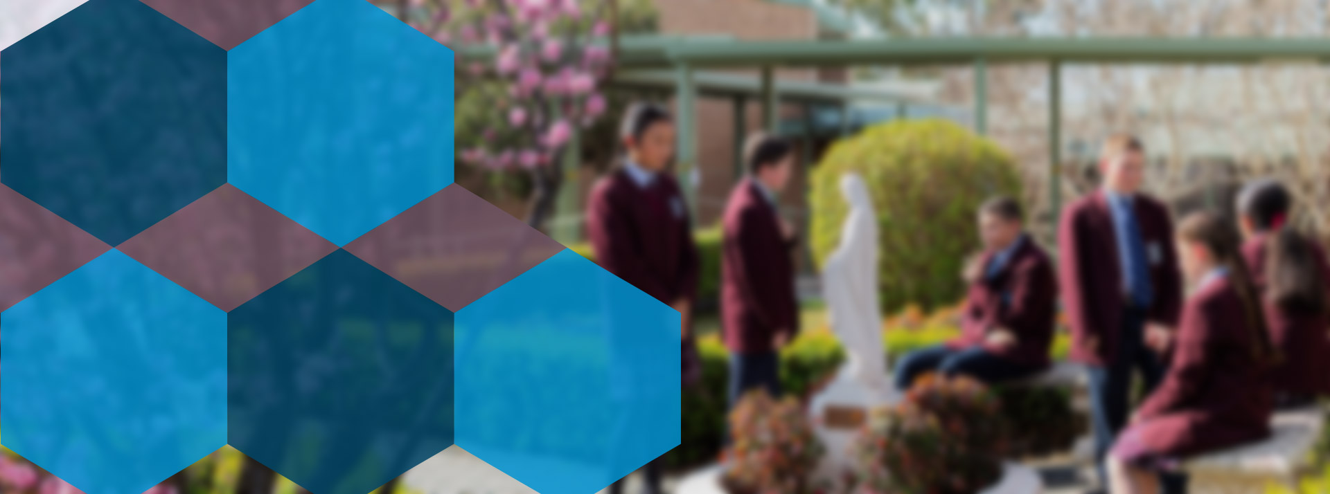 Bede Polding Catholic College South Windsor students sitting in outdoor courtyard