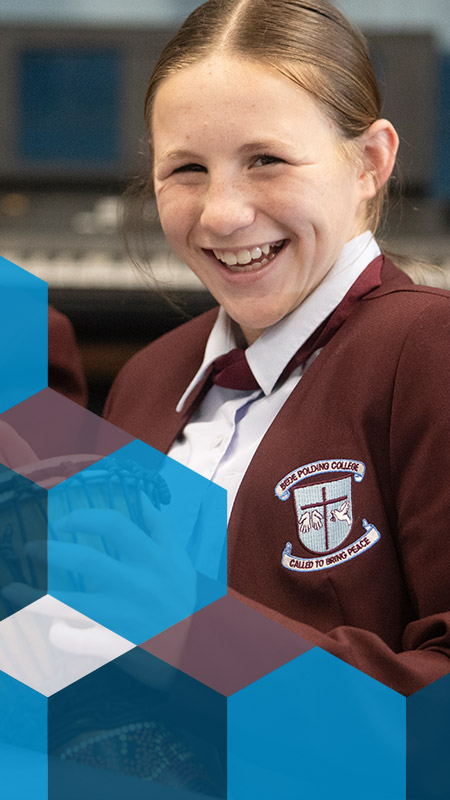 Two happy Bede Polding Catholic College South Windsor students in music class