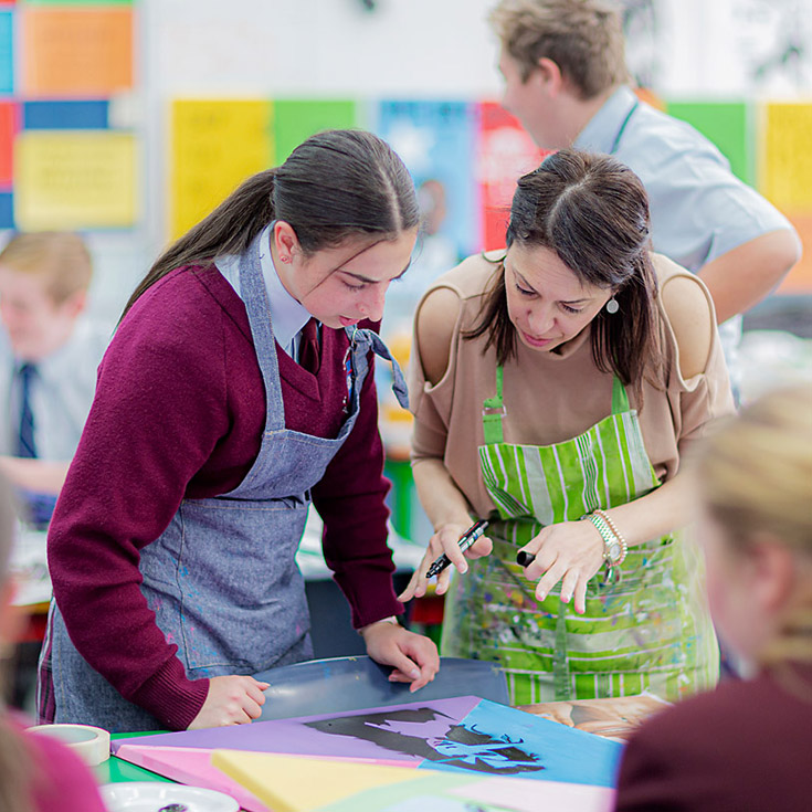 Bede Polding Catholic College Windsor Art teacher assisting student
